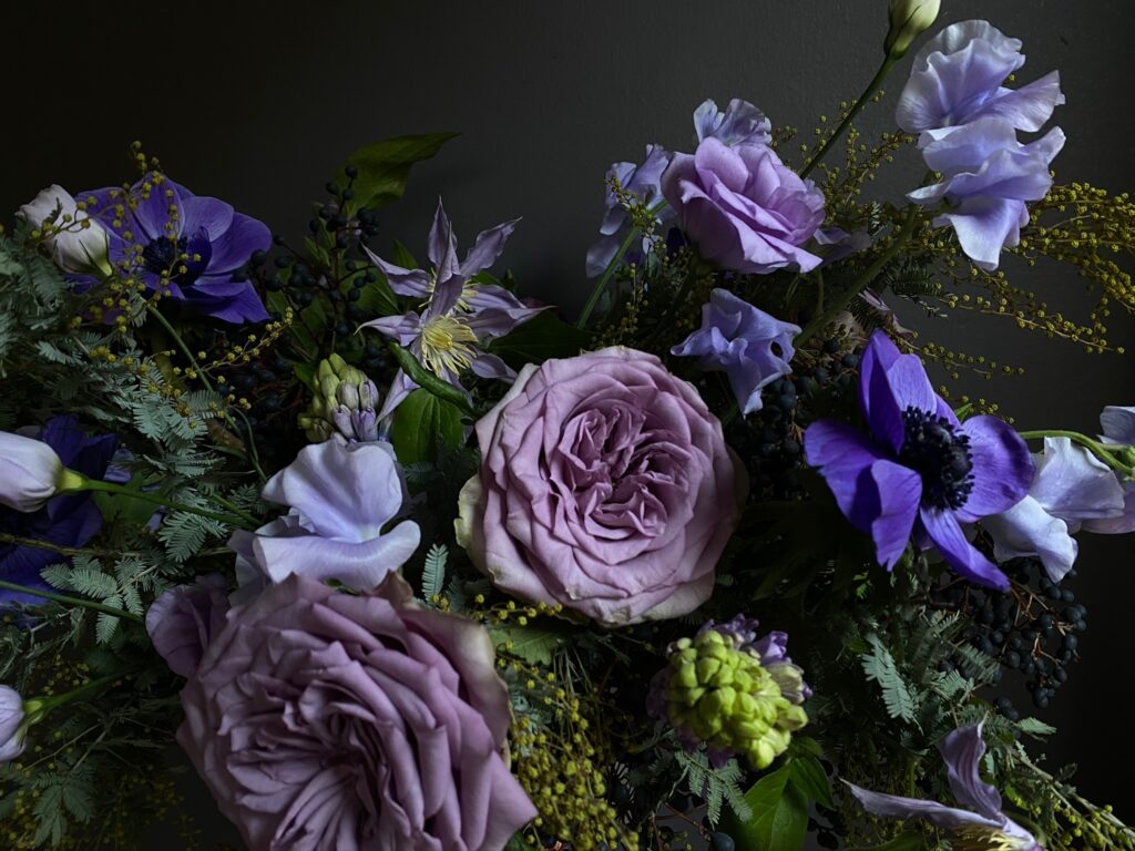 Celestial Floral Arrangement. Celestial shades of blue and purple. Moon-like tones of white and silver.